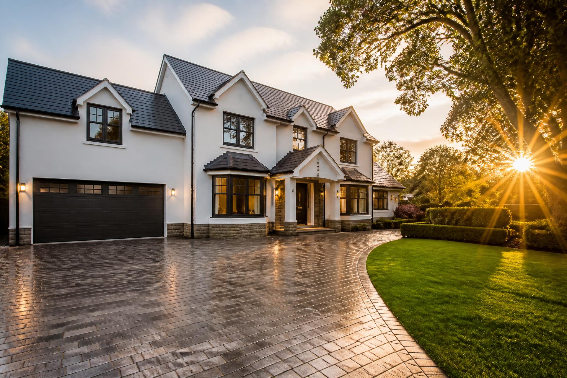 Freshly pressure-washed home exterior at sunset